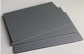 Zinc composite panels in matte grey finish by Nirmaan Groups for facades